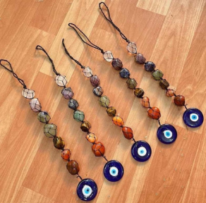 Chakra tumble stone hanging with evil eye pendant